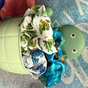 5 Assorted Turtle Scrunchies in an ADORABLE green turtle. Can use anywhere!